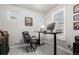 Bright home office featuring a stand-up desk, comfortable chair, and plenty of natural light at 8358 Howell St # B, Arvada, CO 80005