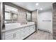 Modern bathroom features double sinks and white vanity at 32399 Woodland Dr, Evergreen, CO 80439
