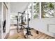 Home gym with weight equipment and large windows offering scenic views at 32399 Woodland Dr, Evergreen, CO 80439