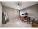 Bedroom features a window for natural light and an orange desk chair at 6011 Welch St, Arvada, CO 80004