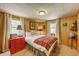 Comfortable bedroom featuring carpet, a large window and a red dresser at 29 Gregory Cir, Breckenridge, CO 80424