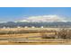 Scenic aerial view featuring snow capped mountains at 868 N Quatar St, Aurora, CO 80018