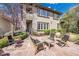 Charming backyard featuring a flagstone patio and lush landscaping at 2616 E Cherry Creek South Dr, Denver, CO 80209