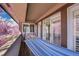 Outdoor balcony featuring a hammock and serene tree views at 2616 E Cherry Creek South Dr, Denver, CO 80209