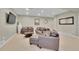 Relaxing basement featuring plush seating, coffee table, and decorative accents at 2616 E Cherry Creek South Dr, Denver, CO 80209