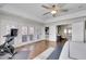 Bedroom with hardwood floors leading to french doors and an adjacent sitting area at 2616 E Cherry Creek South Dr, Denver, CO 80209