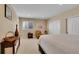 Cozy bedroom with a large window, closet, and neutral decor at 2616 E Cherry Creek South Dr, Denver, CO 80209