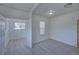 Bedroom featuring smooth transition to the next room and natural light at 5723 Zephyr St, Arvada, CO 80002