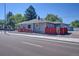 Street view of the home showcasing its charming architecture and well-maintained surroundings at 5723 Zephyr St, Arvada, CO 80002