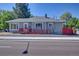Charming home with accessible ramp and freshly painted red accents at 5723 Zephyr St, Arvada, CO 80002