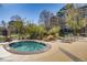 Inviting hot tub with comfortable lounge chairs, and lush landscaping at 1301 Speer Blvd # 403, Denver, CO 80204