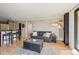 Comfortable living room with an open floor plan, seamlessly connected to the kitchen, with abundant natural light at 1301 Speer Blvd # 403, Denver, CO 80204