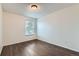 Bedroom with wood floors, fresh paint and natural light at 6610 Monaco Way, Brighton, CO 80602