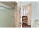 Shower with tile and glass doors at 6610 Monaco Way, Brighton, CO 80602