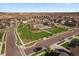 Planned community featuring a central green space, walking paths, and well-maintained homes at 672 W 128Th Pl, Westminster, CO 80234