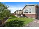 Spacious backyard showcasing a patio, perfect for outdoor dining and relaxation in a private setting at 672 W 128Th Pl, Westminster, CO 80234