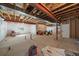 Unfinished basement with high ceilings and potential for expansion at 672 W 128Th Pl, Westminster, CO 80234