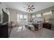 Main bedroom with large windows and ample space at 672 W 128Th Pl, Westminster, CO 80234