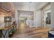 Elegant foyer with hardwood flooring, showcasing the home's open layout and design at 672 W 128Th Pl, Westminster, CO 80234