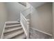 Elegant carpeted staircase with white railings at 672 W 128Th Pl, Westminster, CO 80234