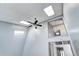 Lofted ceiling featuring a fan and two skylights at 4634 S Fraser Ct # F, Aurora, CO 80015