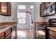 Kitchen featuring wood cabinets, a laminate countertop, and stainless steel appliances at 4634 S Fraser Ct # F, Aurora, CO 80015
