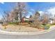 Well-maintained front yard featuring mature landscaping, and a charming single-Gathering home at 6101 E 3Rd Ave, Denver, CO 80220