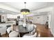 Open layout showcases dining area flowing into the kitchen and front living area at 4250 Marshall St, Wheat Ridge, CO 80033