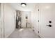 Functional laundry room with ample space, including a water heater and natural light at 4250 Marshall St, Wheat Ridge, CO 80033