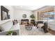 Cozy living room showcasing large windows, modern furniture, and stylish decor at 4250 Marshall St, Wheat Ridge, CO 80033