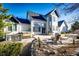 Spacious backyard with hot tub and patio area at 935 Green Gables Cir, Bennett, CO 80102