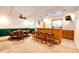 Finished basement with bar and dining area, perfect for entertaining at 935 Green Gables Cir, Bennett, CO 80102