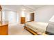 Spacious bedroom with multiple closets and natural light with a standard wooden framed bed at 935 Green Gables Cir, Bennett, CO 80102