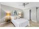 Clean bedroom featuring modern ceiling fan, hardwood style floors and contemporary decor at 159 Judson St, Longmont, CO 80501