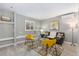 Bright and airy living room with a sofa, chairs, and natural light, perfect for relaxation at 159 Judson St, Longmont, CO 80501