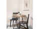 Cozy dining area with a rustic wooden table and modern decor at 1767 N Washington St, Denver, CO 80203