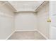 Spacious walk-in closet with wire shelving for efficient storage at 12961 Lafayette St # B, Thornton, CO 80241