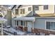 Townhome exterior showcasing winter landscaping and a welcoming entrance at 12961 Lafayette St # B, Thornton, CO 80241