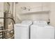 Laundry room with washer, dryer, and water heater at 12961 Lafayette St # B, Thornton, CO 80241