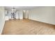 Spacious living room with wood-look floors and ample natural light at 6980 E Girard Ave # 204, Denver, CO 80224