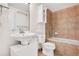 Clean bathroom with a bathtub and updated fixtures at 1617 California St # 3B, Denver, CO 80202