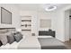 Main bedroom with modern decor and ample light at 1617 California St # 3B, Denver, CO 80202