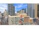 Denver building with city view showcasing architecture and urban landscape under a bright sky at 1617 California St # 3B, Denver, CO 80202