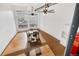 Sunlit dining area with hardwood floors and city views at 1617 California St # 3B, Denver, CO 80202