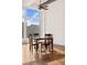 Bright dining area featuring hardwood floors, a ceiling fan, and a table with four chairs at 1617 California St # 3B, Denver, CO 80202