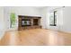 Cozy living room with fireplace and hardwood floors at 4906 S Crystal St, Aurora, CO 80015