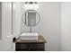 Modern powder room features a square sink and brushed nickel faucet at 4906 S Crystal St, Aurora, CO 80015