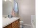 Bathroom with tub shower, white vanity, neutral countertops, and tile flooring at 1385 W 112Th Ave # D, Denver, CO 80234