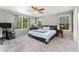 Bedroom with lots of natural light, ceiling fan, and neutral colored walls at 1385 W 112Th Ave # D, Denver, CO 80234