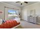 Bedroom with a large window overlooking the outdoors, a closet, and a comfortable bed at 16440 Old Denver Rd, Monument, CO 80132